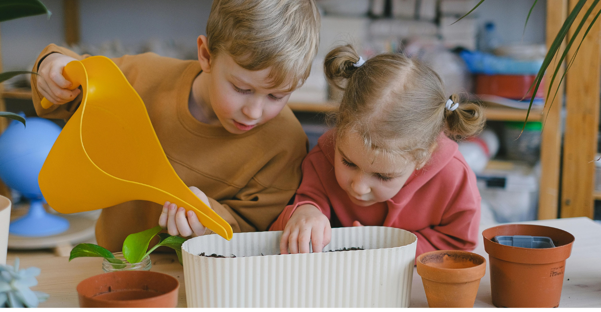 Children watering seeds